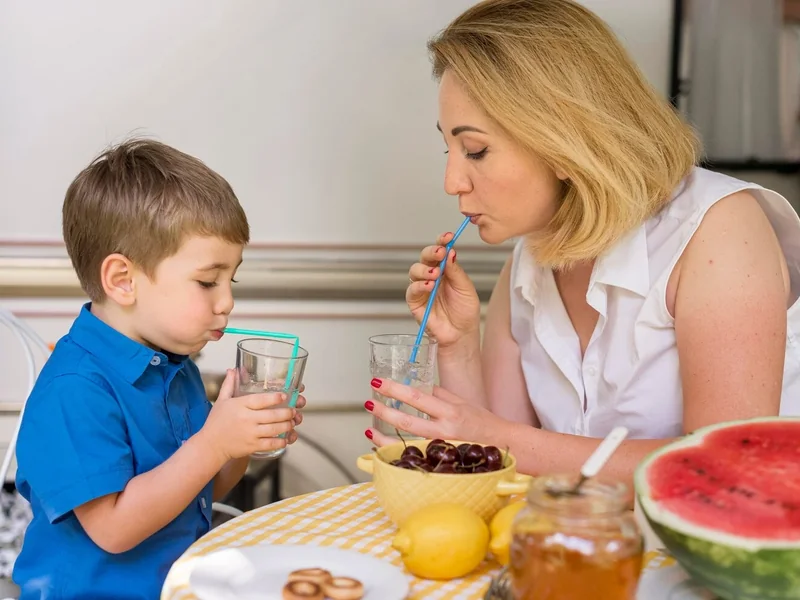Child and parent at the table during a feeding therapy session